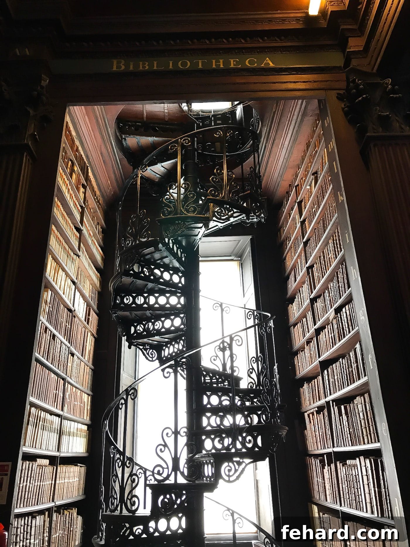 Intricate spiral stairs within the historic Library of Trinity College Dublin