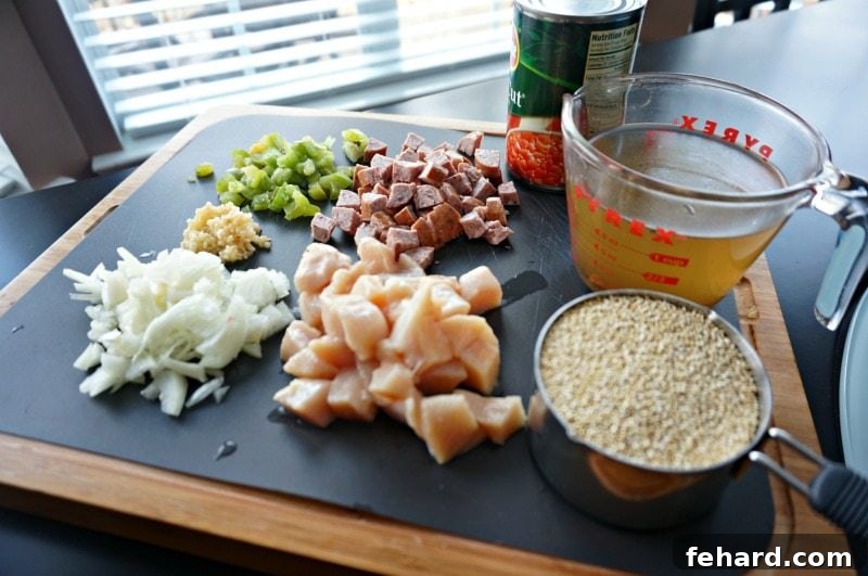 Fresh ingredients laid out on a cutting board, ready for Quinoa Jambalaya preparation