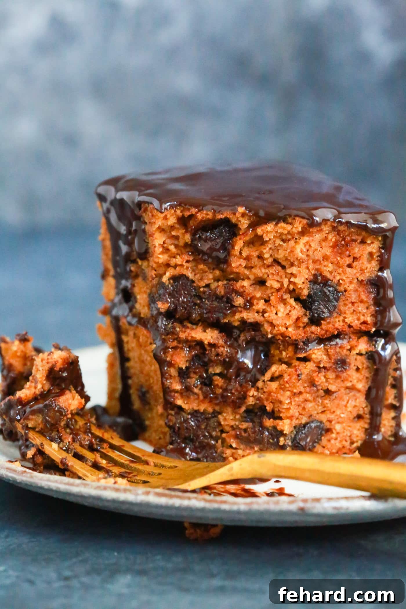 Overhead shot of freshly baked chocolate pumpkin cake squares with frosting, ready to serve.