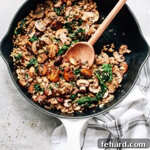 Healthy & Delicious Cauliflower Rice 9 overhead view of a white skillet contains Mushroom Cauliflower Rice