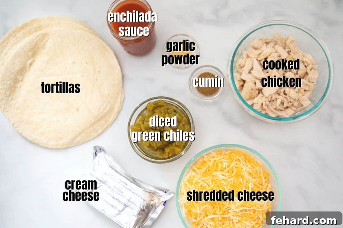 Chicken Enchiladas with Cream Cheese Ingredients All the fresh ingredients for homemade chicken enchiladas laid out on a kitchen counter, including shredded chicken, cream cheese, green chilies, tortillas, and cheese.