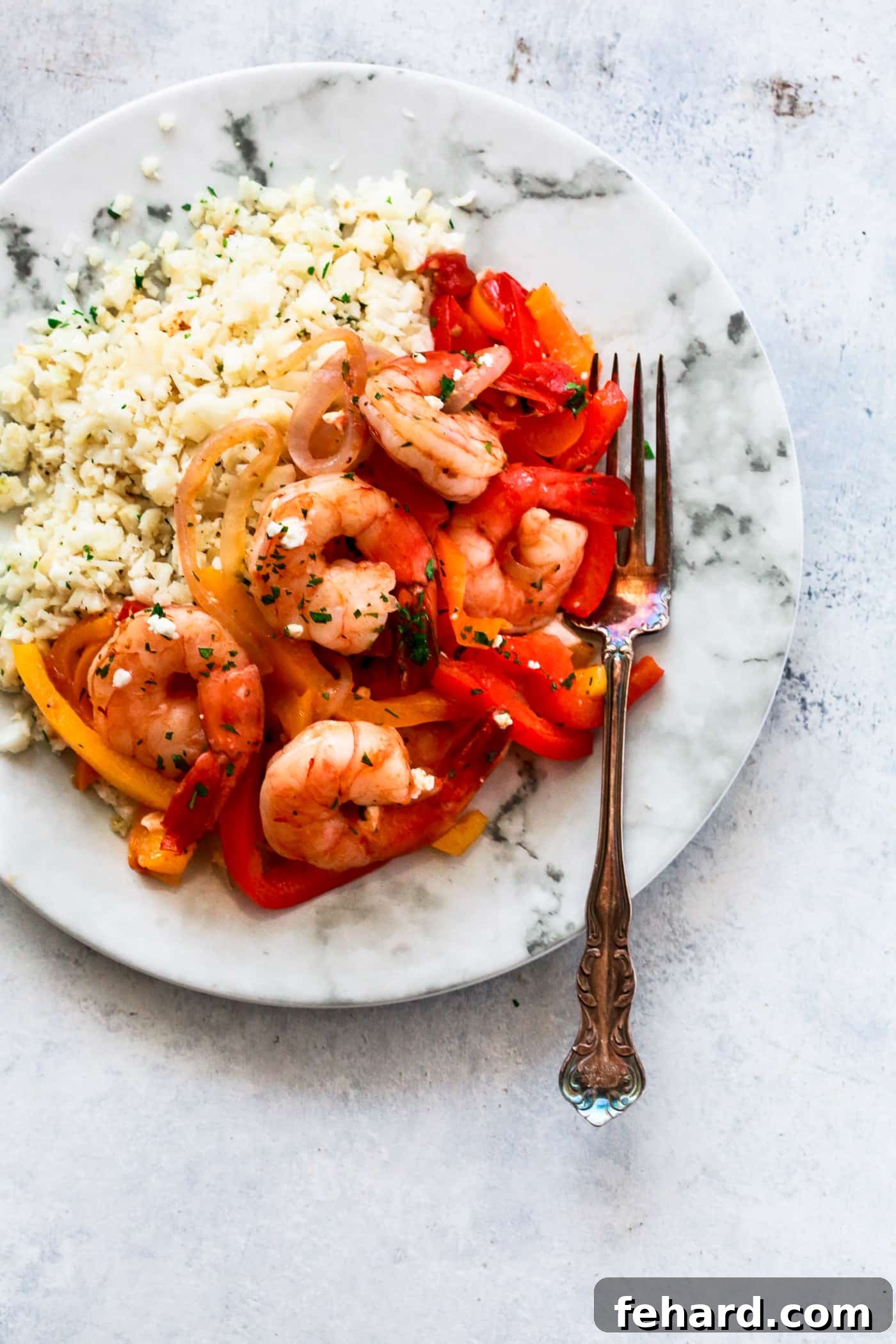 A visually appealing shot of the freshly cooked Shrimp, Bell Pepper and Onions Skillet, ready for serving.