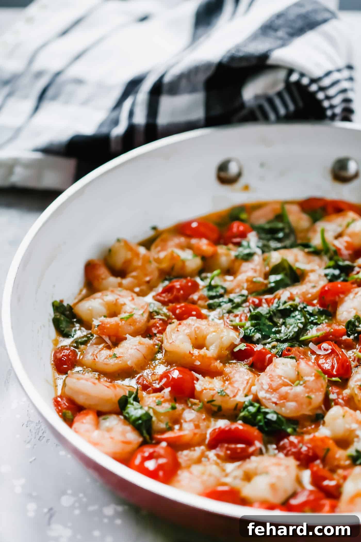Parmesan Shrimp Perfection 5 Creamy parmesan shrimp in a skillet.