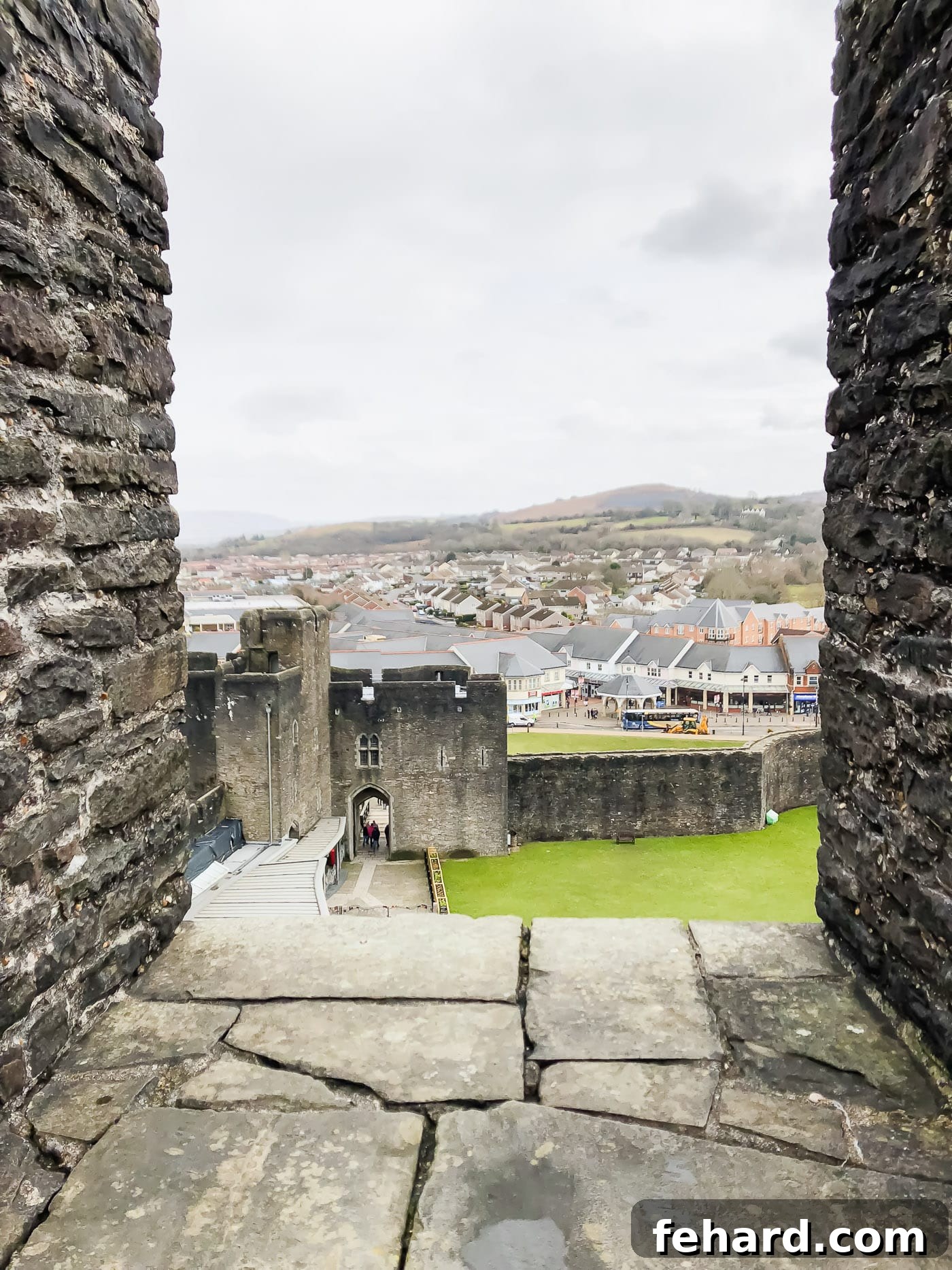 Exterior view of the Caerphilly Castle, emphasizing its impressive size and setting
