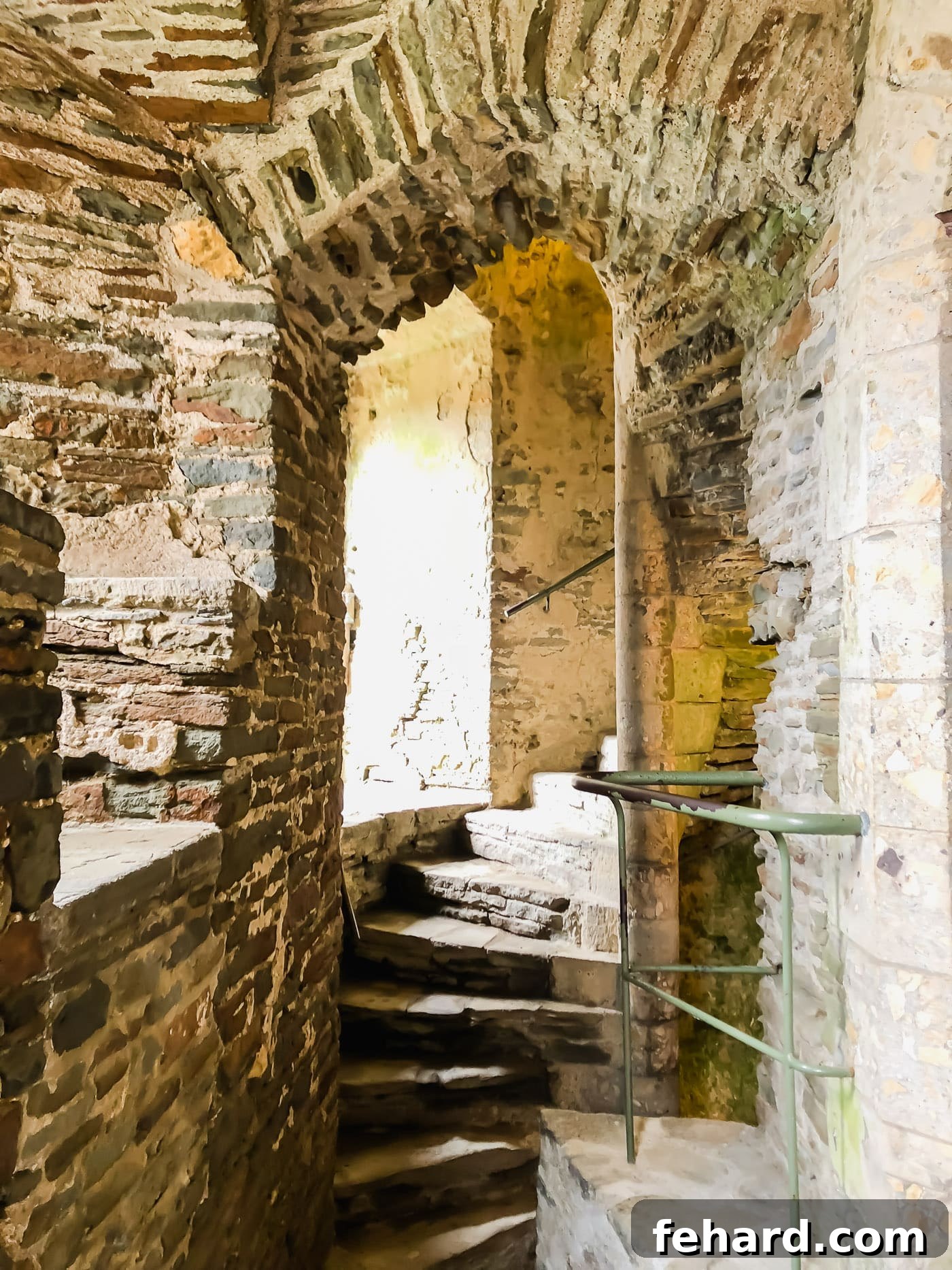 Interior view of the spiral stairs at Caerphilly Castle, showing access to different levels