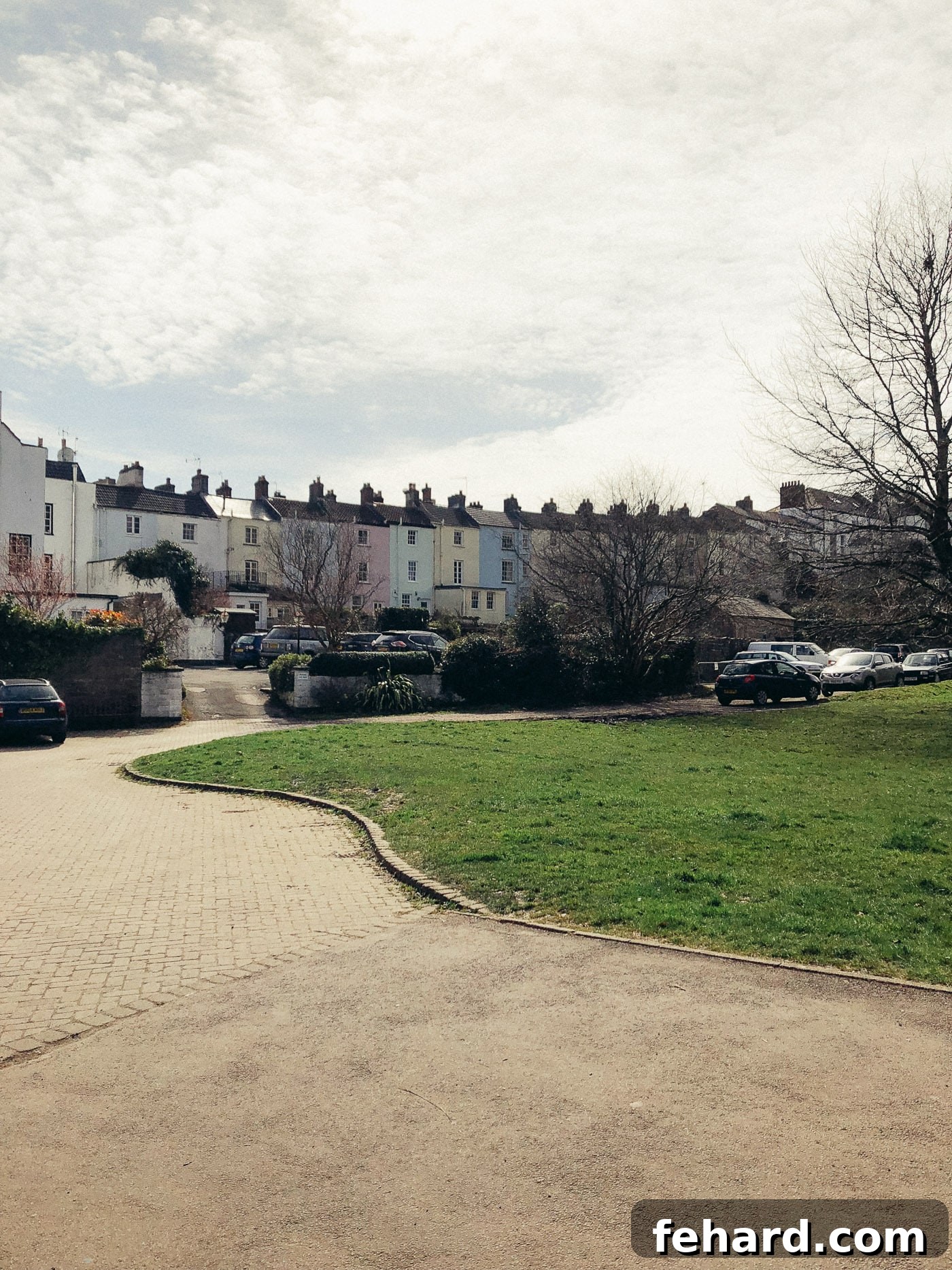 View of quaint, colorful little houses near Chepstow Castle, adding to the picturesque scenery