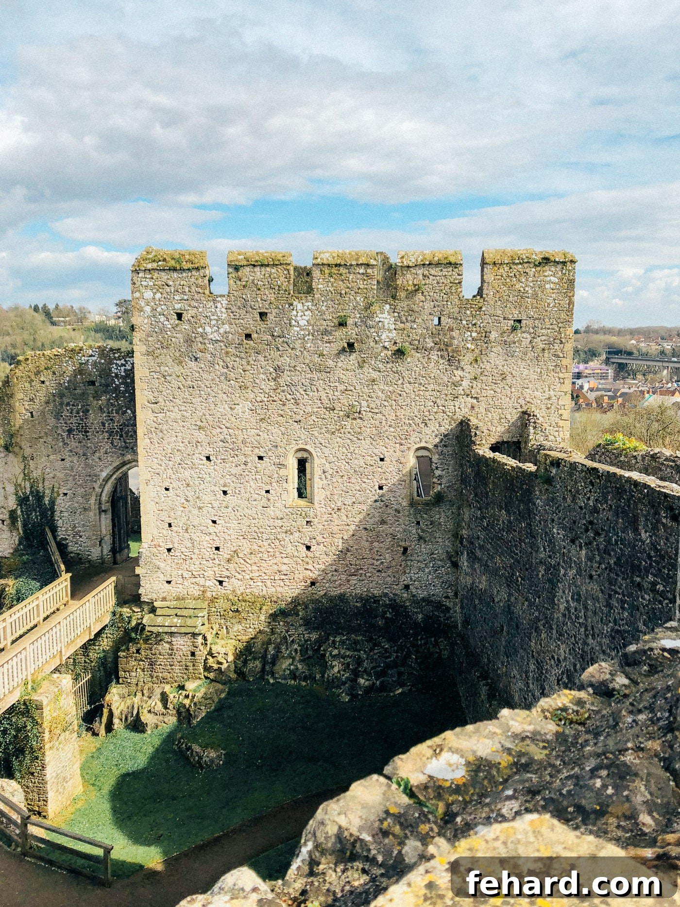 Detailed exterior shot of Chepstow Castle, focusing on its ancient stone craftsmanship