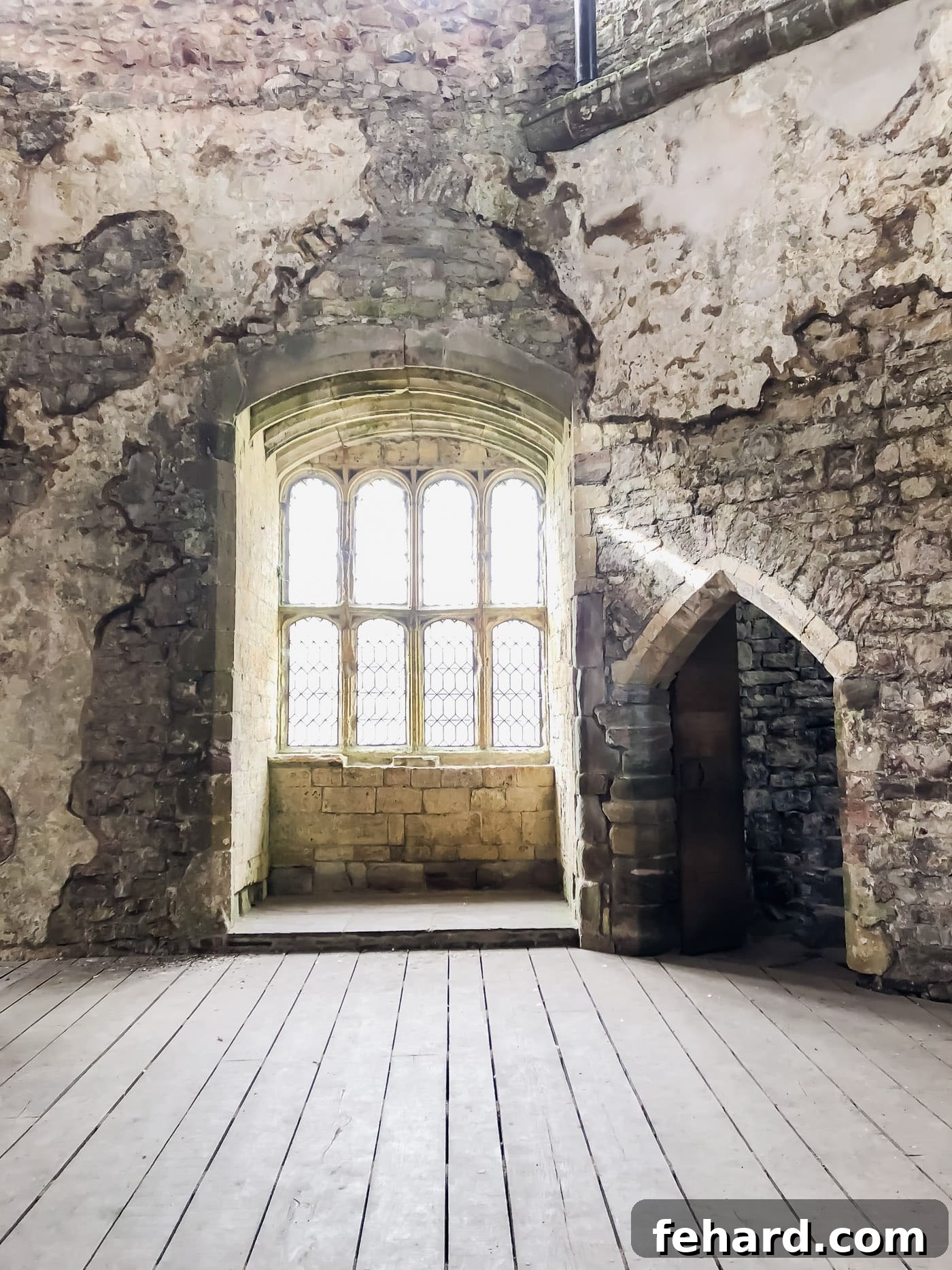 Inside view of the ruins of Chepstow Castle, showing its grand arches and weathered walls
