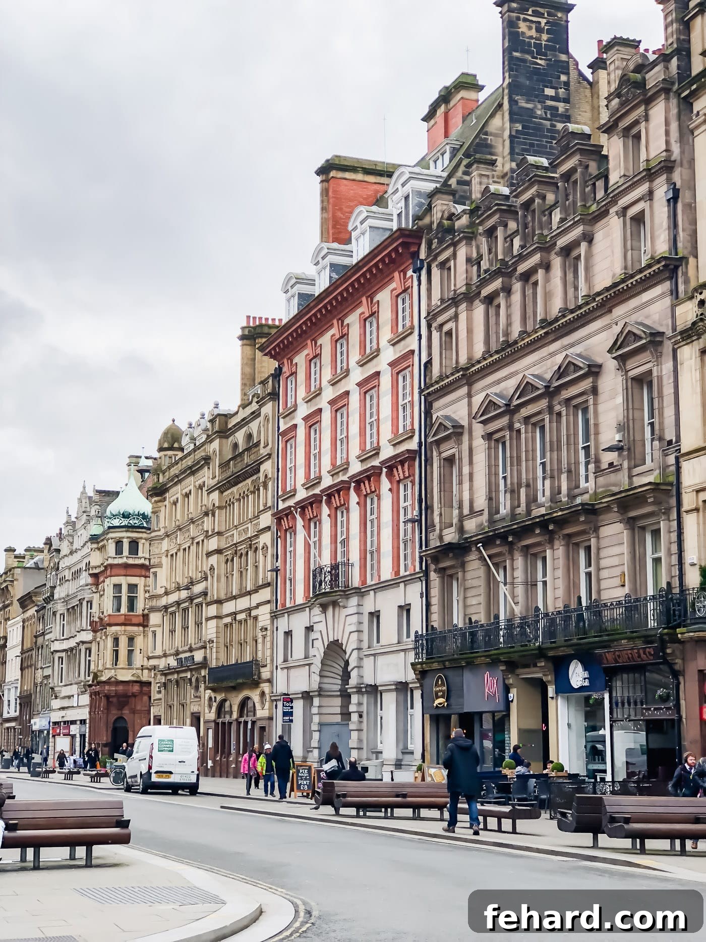 A picturesque street scene in Liverpool, adorned with beautiful historic buildings