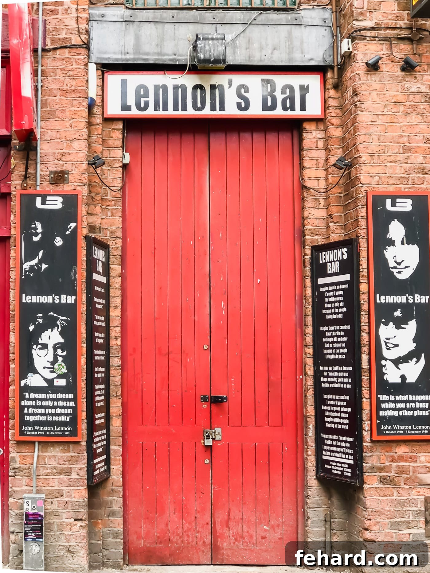 A different angle of the exterior of 'Lennon's Bar' in Liverpool, capturing its street presence
