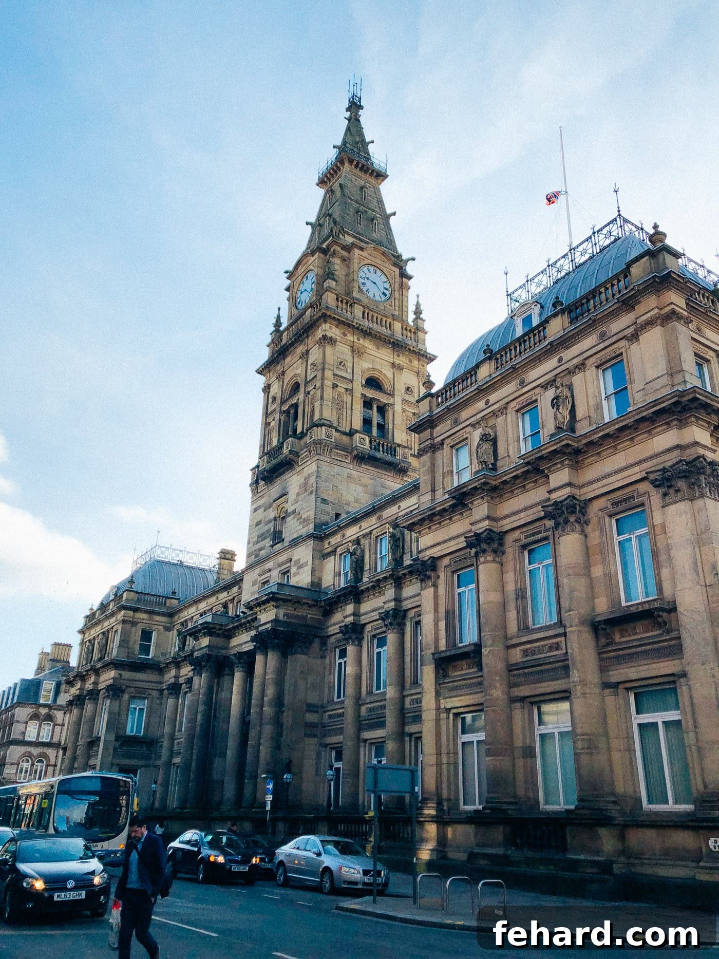 A lively street scene in Liverpool, featuring beautiful architecture and vibrant activity