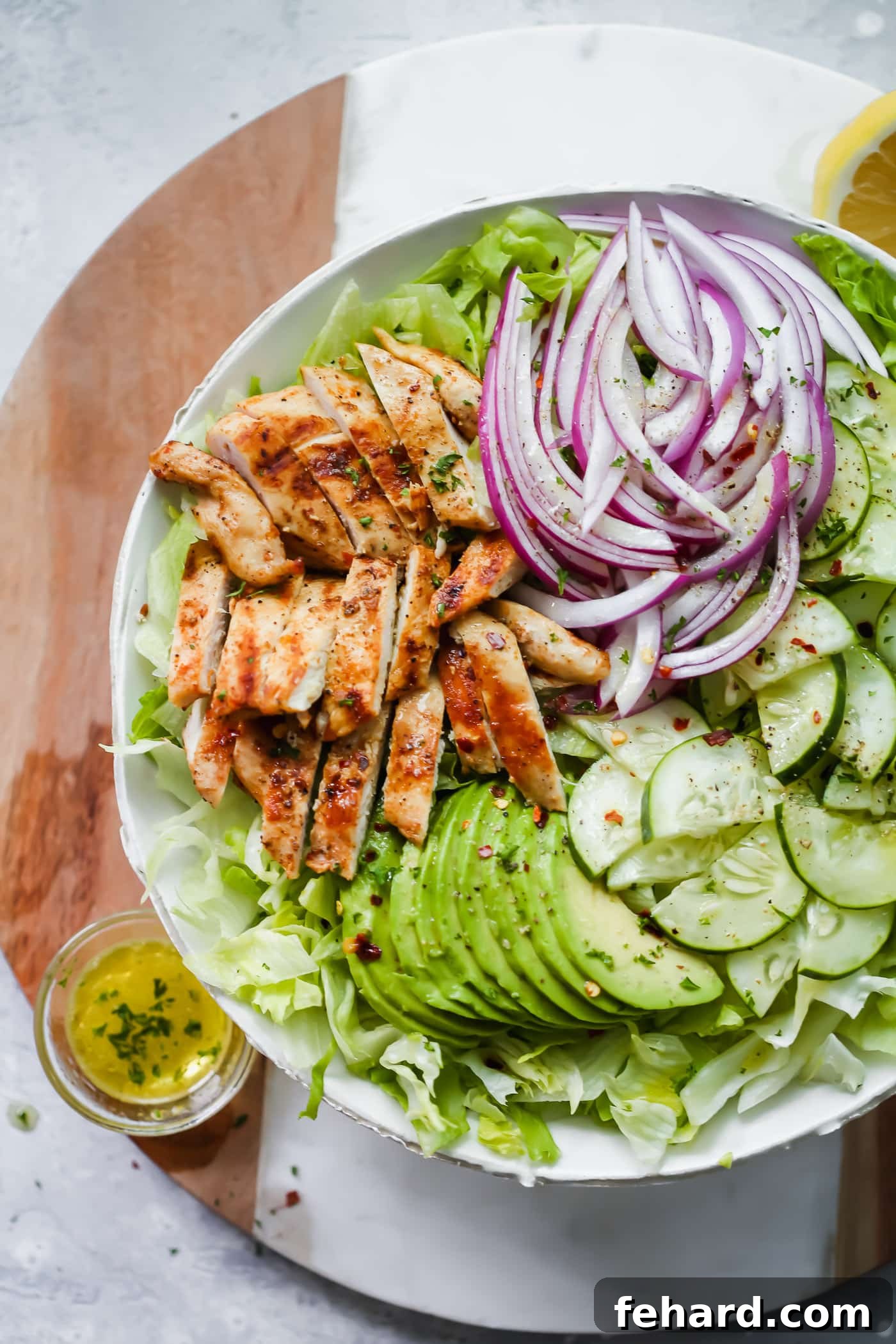 Delicious and healthy Grilled Chicken Avocado Salad, bursting with fresh ingredients.