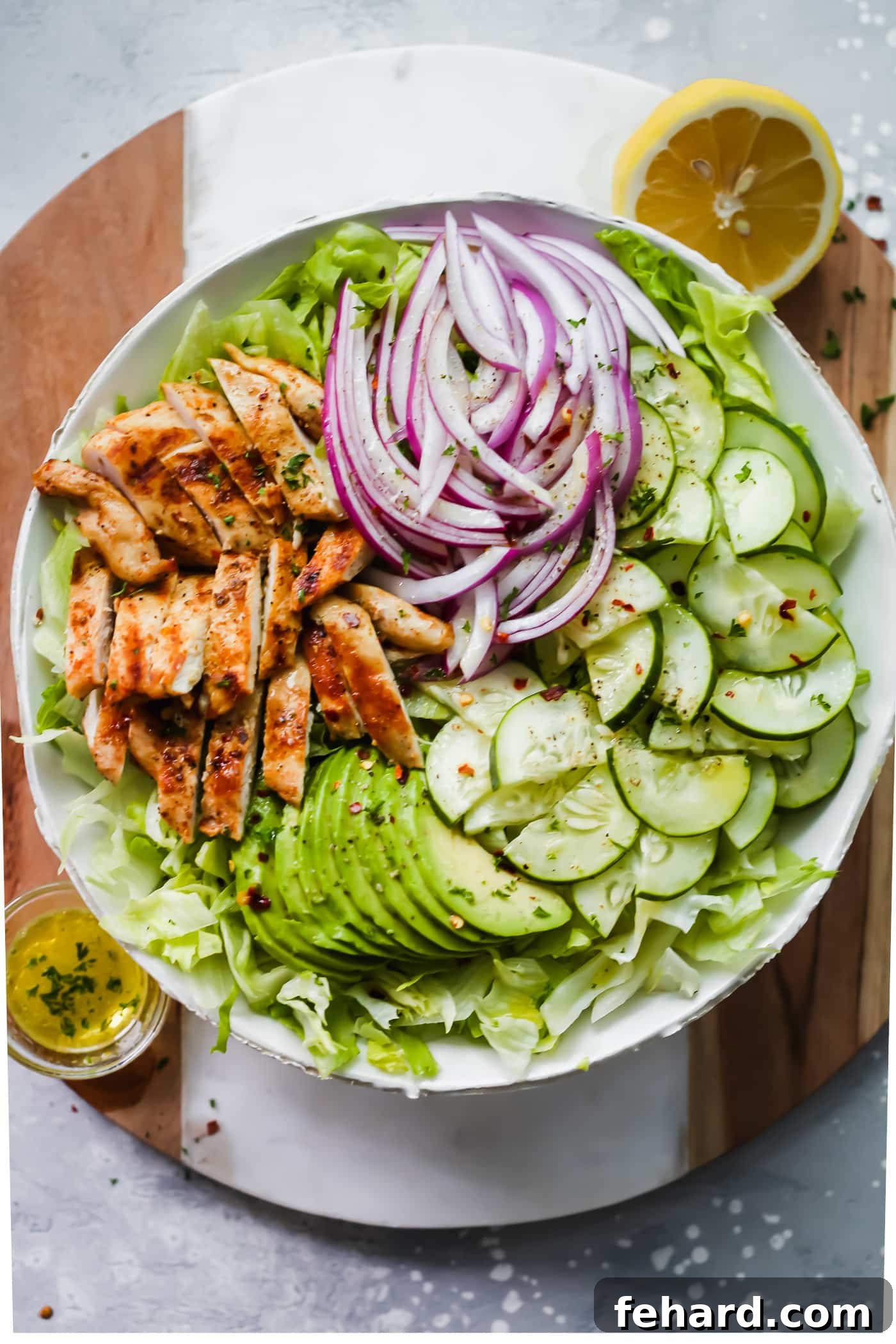A close-up view of a fresh and healthy Grilled Chicken Avocado Salad.