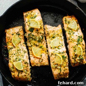 Baked salmon with lemon in a cast iron skillet