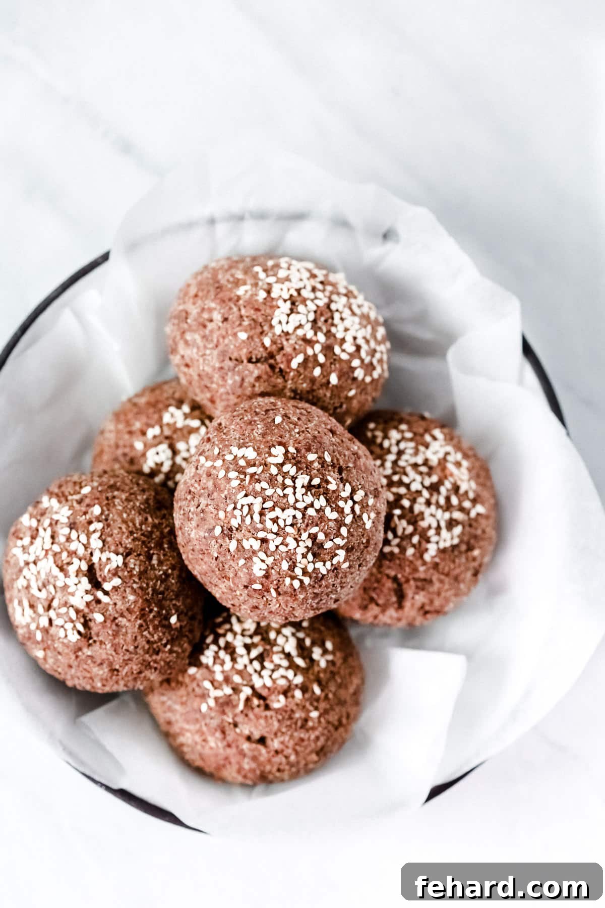 Fluffy Keto Dinner Rolls 3 Low-carb Dinner Rolls in a basket to serve on the table