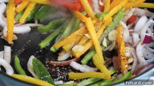 Sautéed vegetables in a cast iron skillet.