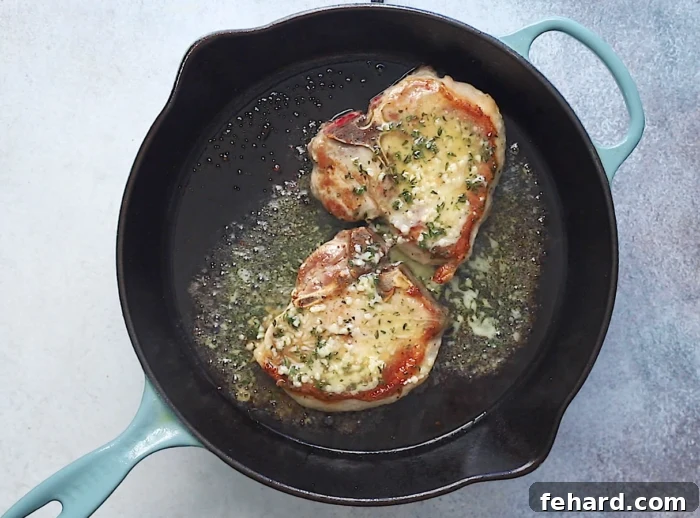 pour garlic butter on top of the pork chops after baking for extra flavor