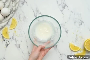 Bowl with lemon powdered sugar glaze.