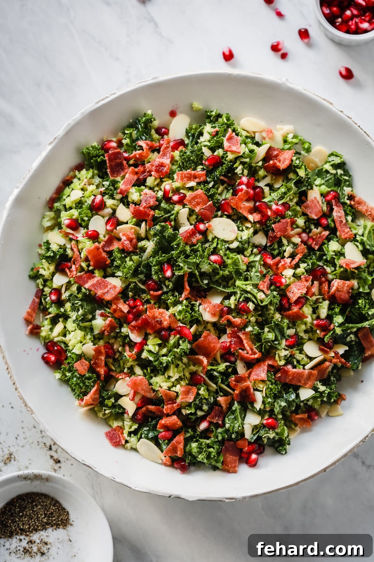 Shredded Brussels Sprout Salad with a side of dressing