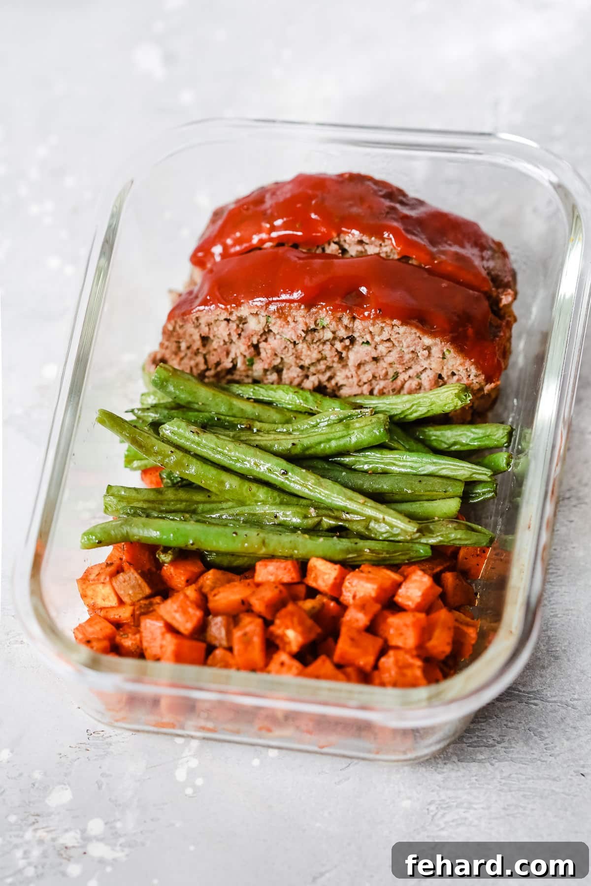 Overhead view of a Healthy Meatloaf Meal-Prep Bowl. A complete and balanced meal.