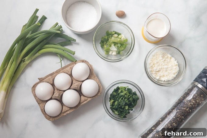 A flat lay photograph displaying all the fresh ingredients needed for an Instant Pot Frittata: eggs, milk, various spices, and colorful vegetables, neatly arranged on a white kitchen counter.