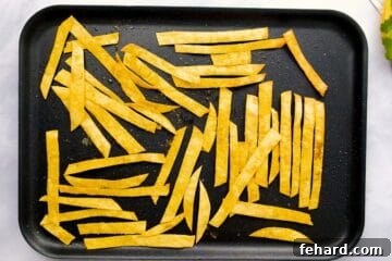 Hearty Instant Pot Chicken Tortilla Soup 10 Corn tortillas cut into strips and seasoned and baked until crispy on baking sheet.