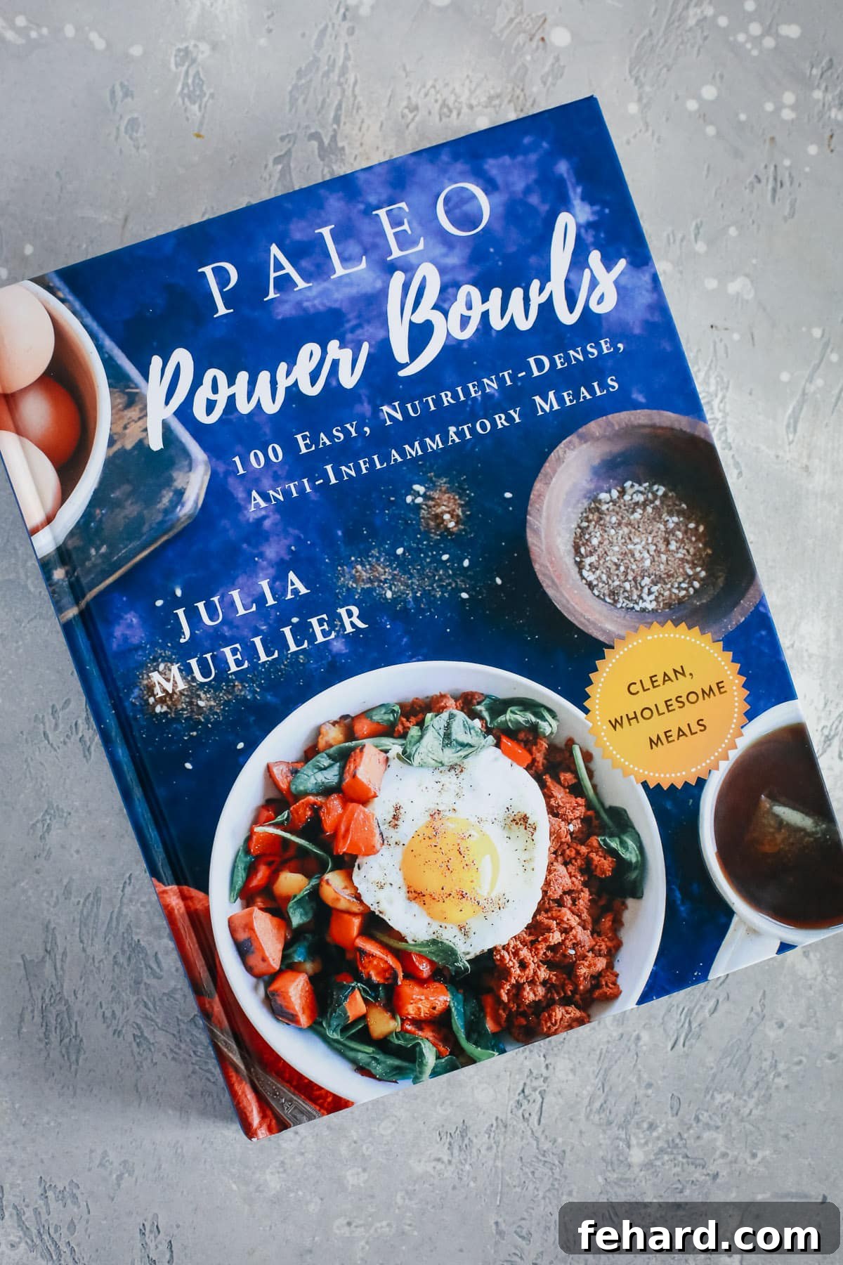 Overhead view of Julia's cookbook, Paleo Power Bowls, featuring a collection of wholesome and easy recipes.