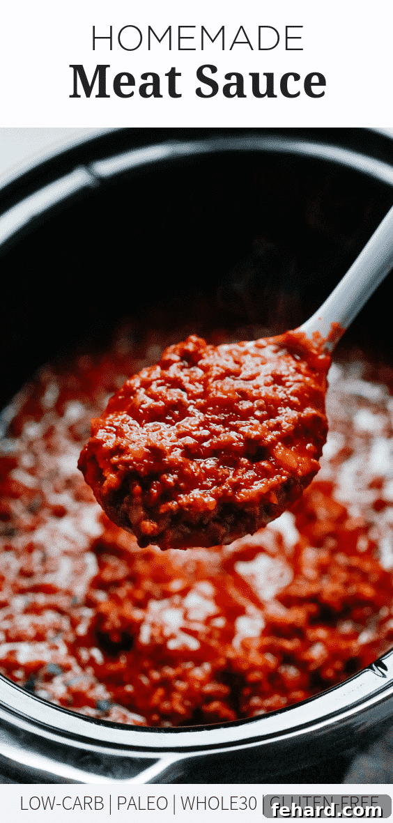 Homemade Meat Sauce with fresh herbs as garnish, highlighting its fresh ingredients.