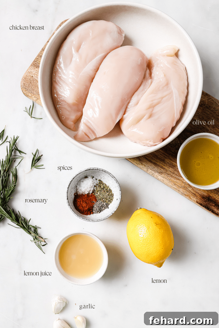 Prepped ingredients on a cutting board and white countertop.