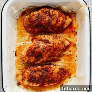 Simple Baked Chicken Breast, seasoned and golden brown.