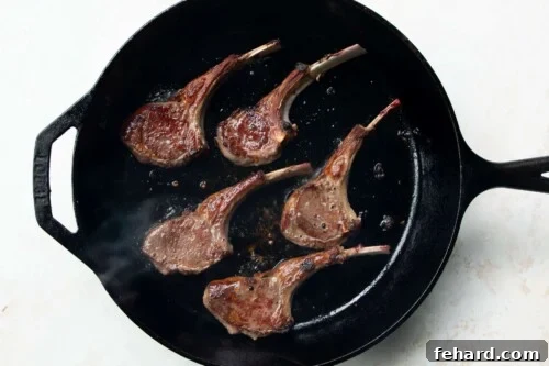 lamb chops in a skillet