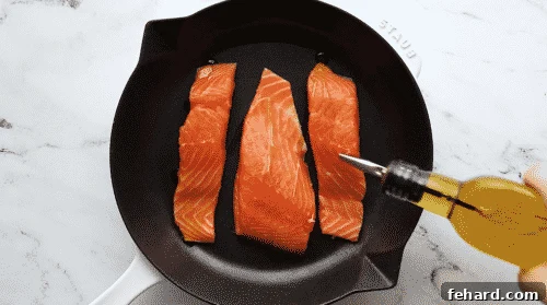 Oiling salmon fillets before baking