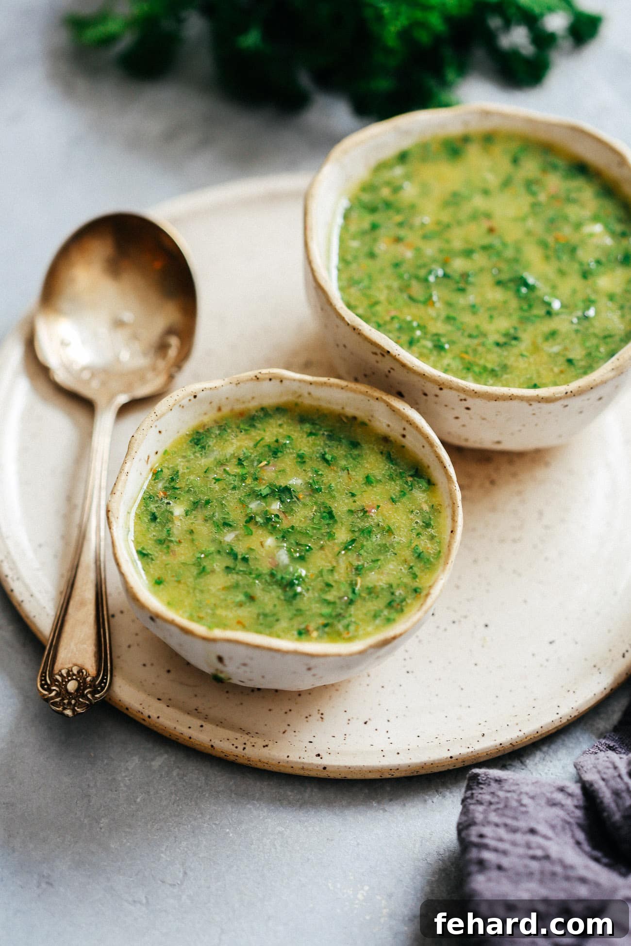 2 small dishes of green chimichurri sauce