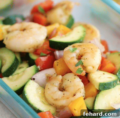 Weekly Shrimp & Veggie Power Bowls 5 close up of shrimp and veggies in a glass container