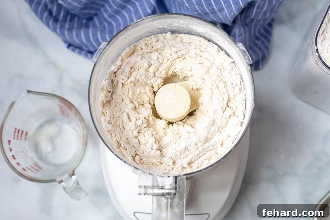 Easy Biscuit Recipe Biscuit dough in food processor.
