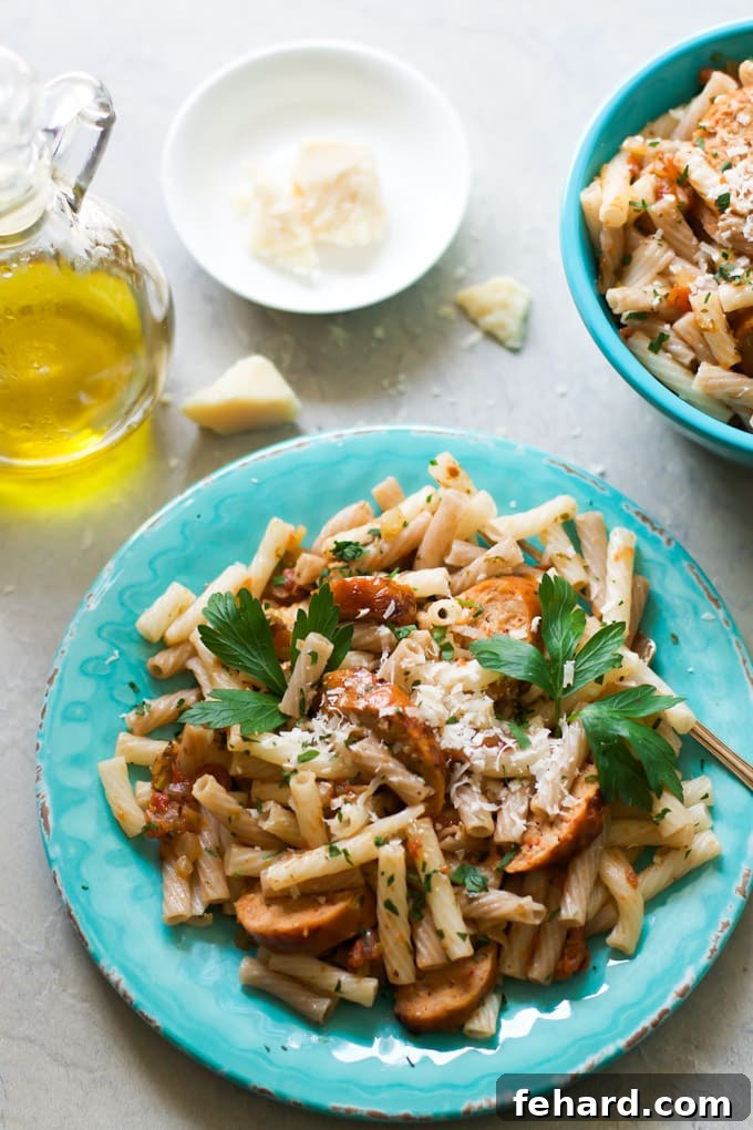 Sausage Quinoa Pasta - A Wholesome Dinner Delicious Sausage Quinoa Pasta served in a rustic bowl, garnished with fresh herbs