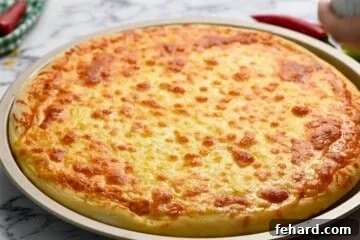 Hot Wing Pizza 8 Baked Buffalo Chicken Pizza on baking sheet.