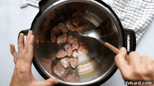 sautéed beef stew meat in a instant pot