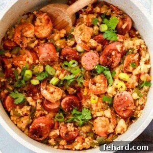 overhead view of a white pot containing whole30 jambalaya
