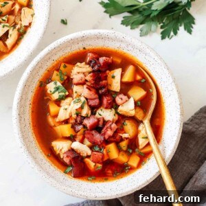 Hearty Turkish Vegetable Soup 9 Close up shot of a turkey soup bowl, garnished with herbs.