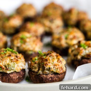 closeup of sausage stuffed mushroom.