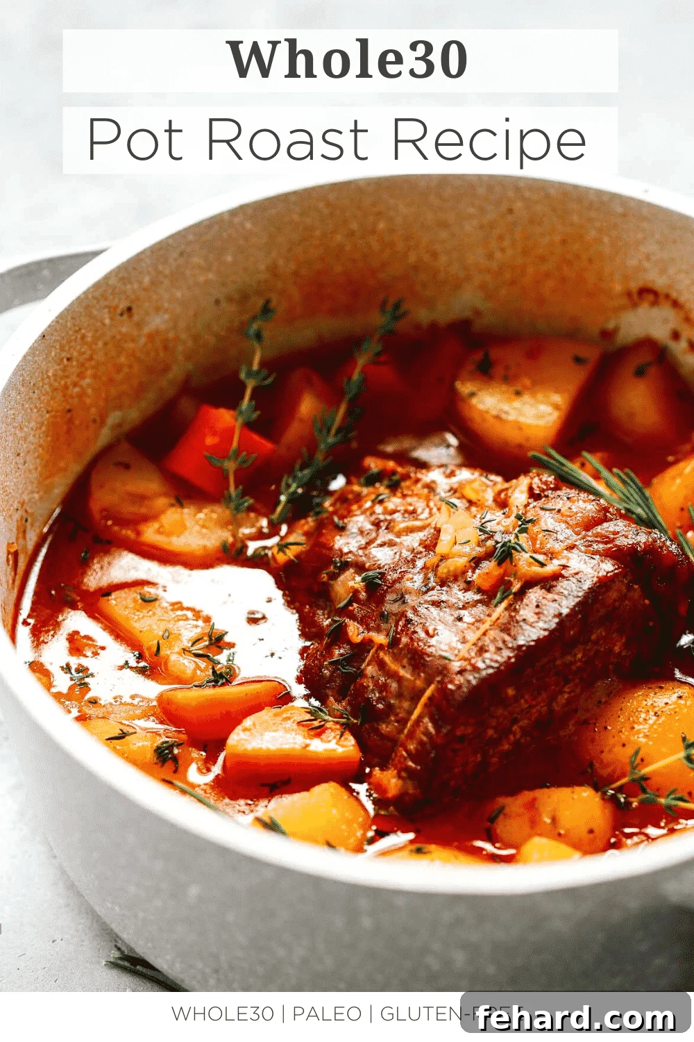 Tender Whole30 Pot Roast 14 close up of a large white pot containing Whole30 Pot Roast