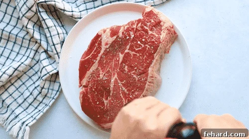 Tender Whole30 Pot Roast 7 overhead view of raw beef chuck in a white plate