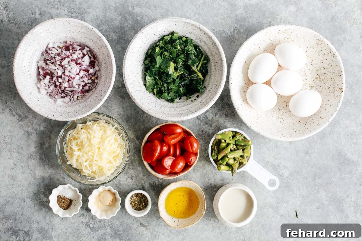 Assortment of fresh and prepared ingredients including eggs, chopped vegetables, and cheese, ready for a baked frittata recipe.