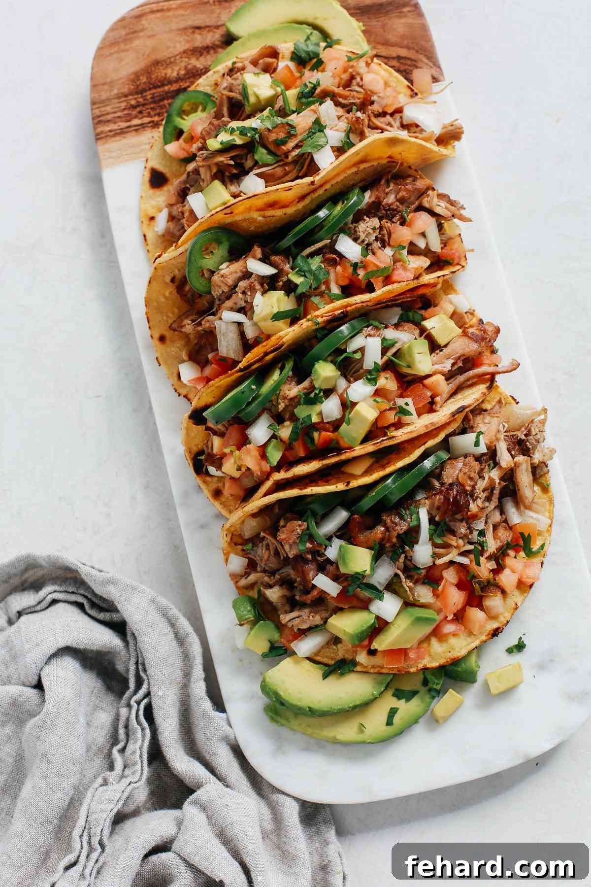 tray of slow cooker carnitas tacos