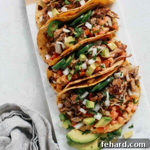 tray of slow cooker carnitas tacos