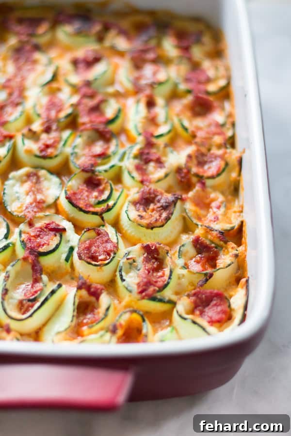 Garden Zucchini Gratin 4 Zucchini lasagna rolls in a casserole dish, an elegant and flavorful twist.