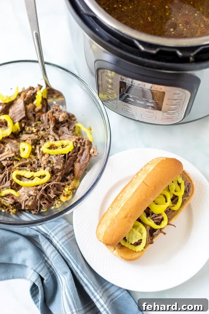 Instant Pot Italian Beef Serving Suggestions A beautifully presented bowl of shredded Instant Pot Italian Beef, alongside a classic Italian Beef Sandwich, with an Instant Pot in the background, highlighting meal possibilities.