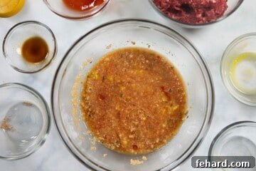 Ingredients for Meatloaf mixed together in large mixing bowl before adding meat.