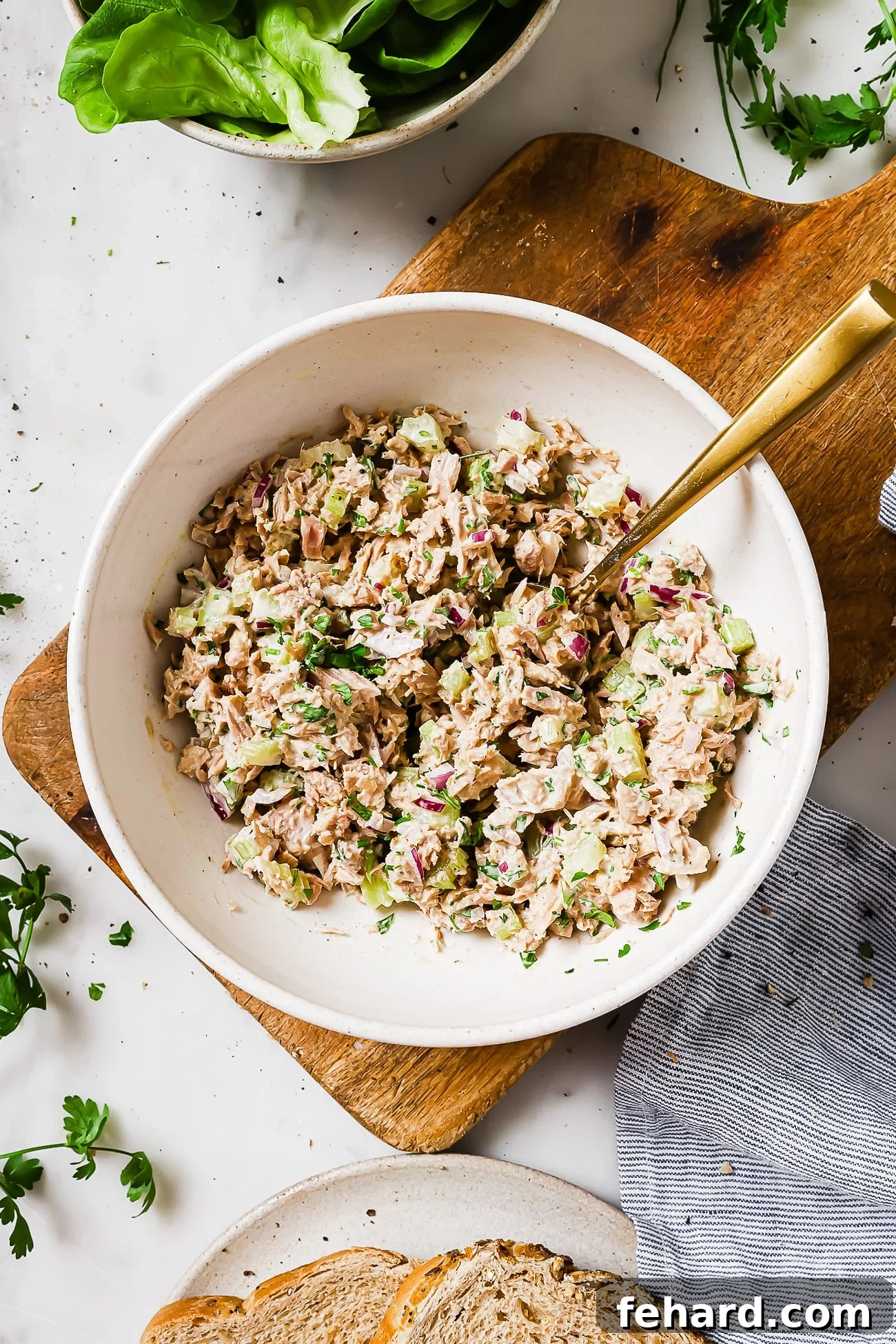 Effortless Meals from Your Pantry: 18 Recipes 4 Overhead view of tuna salad in a white bowl.